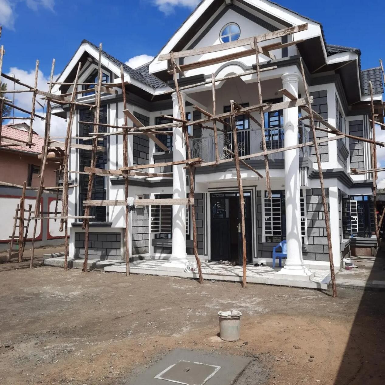 Kamulu Gardens house under construction with timber scaffolding
