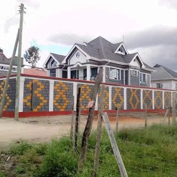 Patterned perimeter wall and exterior of the Kamulu Gardens residence