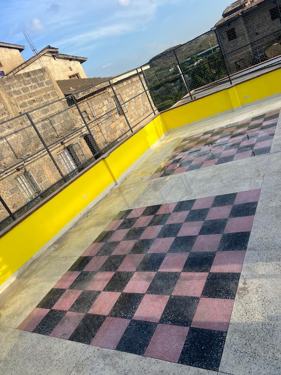 Tiled rooftop terrace at the Smiling Centre in Lucky Summer, Nairobi